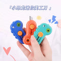 Dino Pen Cutter