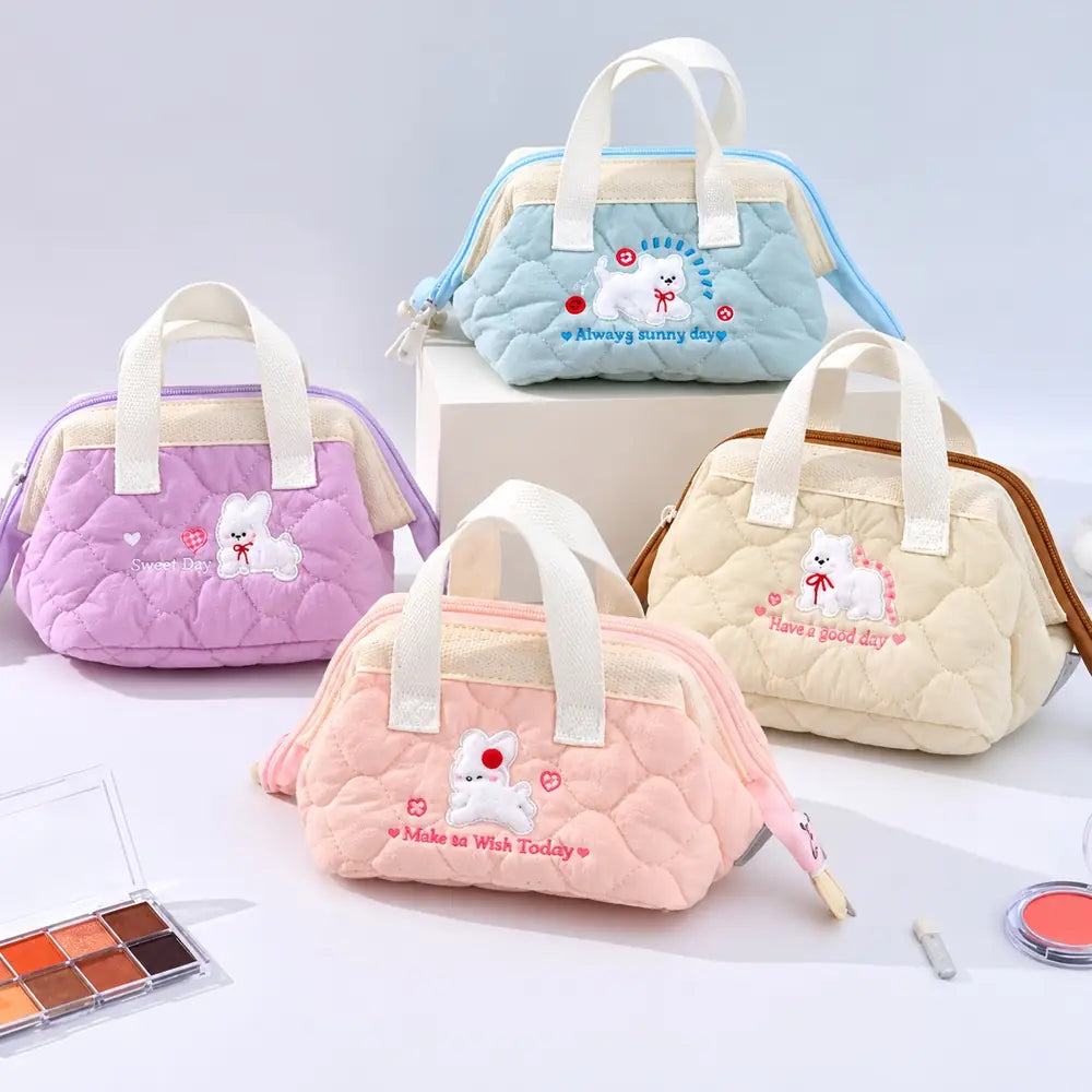 Fluffy Bunny Cosmetic Bag with quilted fabric and cute bunny embroidery in pastel colors.