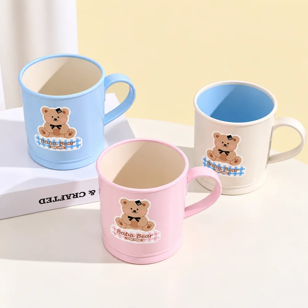 Kawaii mini cup with cute bear design in pink, blue and cream pastel colours.