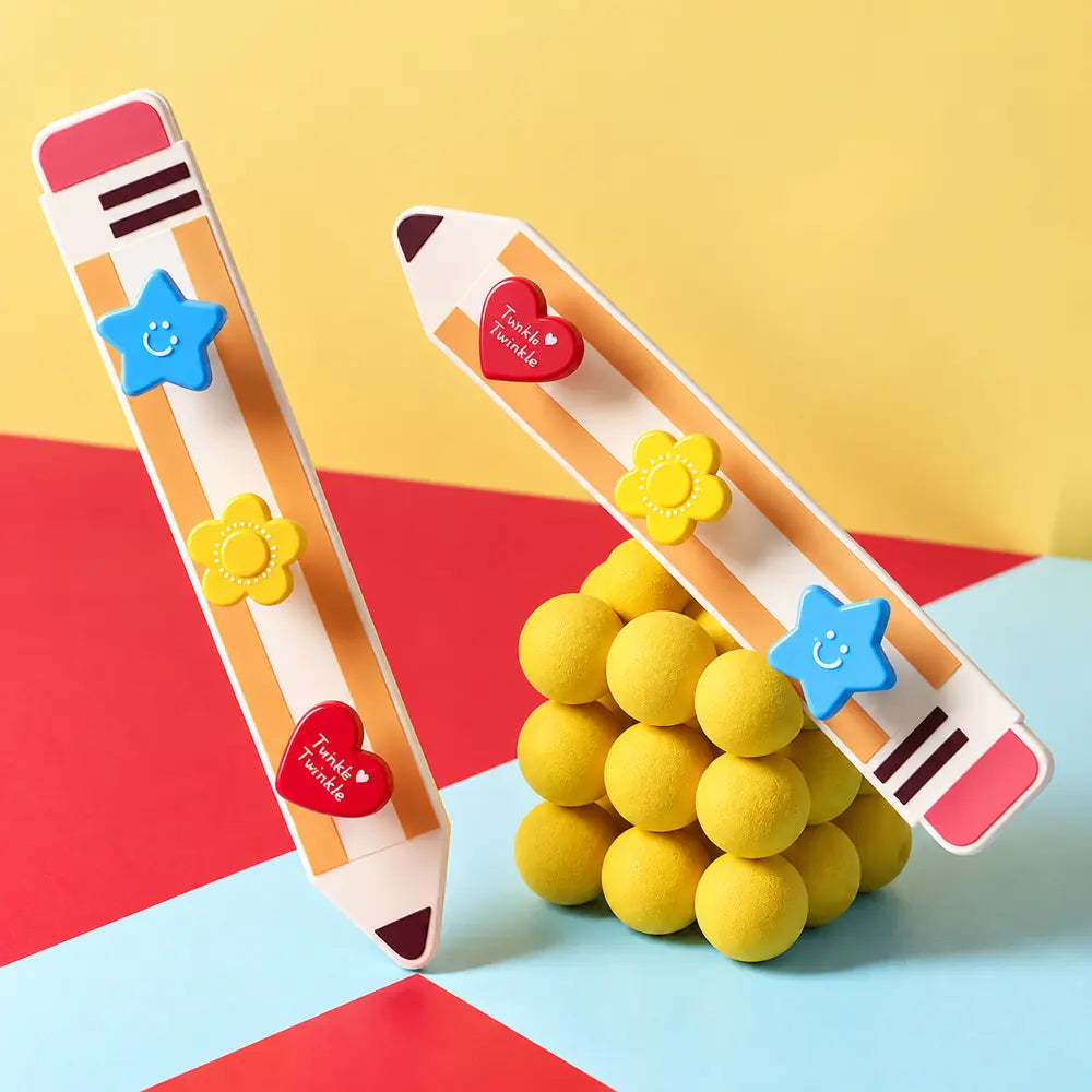 Kawaii pencil-shaped wall hook with heart, flower and star design for hanging keys, bags and headphones.