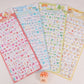 Kawaii 3D puffy sticker sheets with colourful mini characters, fruits, animals and food designs