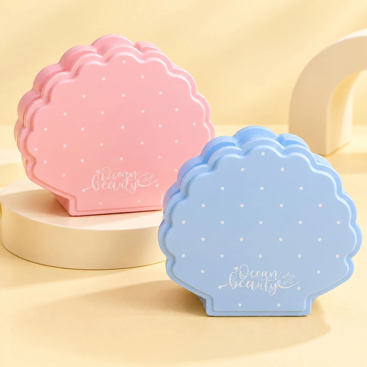 Kawaii shell-shaped desk organizer in pastel pink and blue