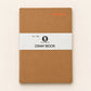 A brown kraft paper notebook with a white paper band around the middle, featuring the text 'Notebook', 'Size : Big', the 'Color Master' logo, and 'DRAW BOOK' in black. The notebook is photographed flat against a light beige background.