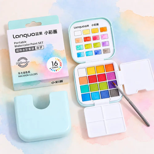 Pastel blue portable watercolor paint set with 16 macaron colors, mixing palette, brush, water container, and storage box.