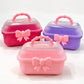 Pinteresty Makeup Organizer with cute pink bow, transparent ribbed lid and beaded handle, available in pastel pink, hot pink and purple.