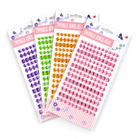 Four packages of Twinkle Jewel Seal rhinestone stickers arranged in a fan shape on a light beige background. The packages contain rhinestones in purple, green, orange, and pink, with pink striped borders at the bottom of each card.