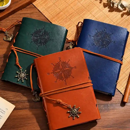 Vintage Compass A5 Leather Diary with embossed compass design, wraparound leather cord and antique nautical charms.
